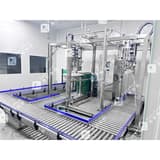 Aseptische zakvulmachine: lijnaanzicht (hoek + transportbanden)