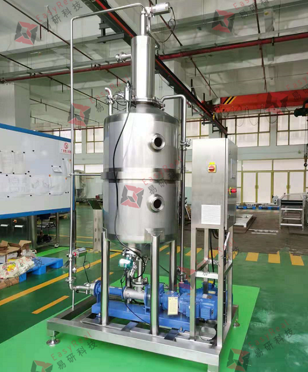 Vacuum deaerator for mango pulp and juice, stainless-steel tank system removing air to prevent oxidation and preserve color and flavor in mango processing plant.