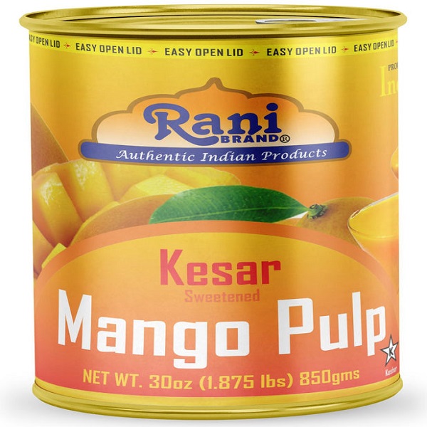 Canned mango pulp , aseptically packed for export markets, showing consistent quality from EasyReal mango pulp processing plant.