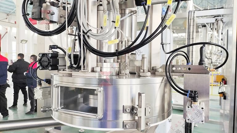 Sanitary aseptic filling head close-up with hose connections for steam-sterilized bag spout interface