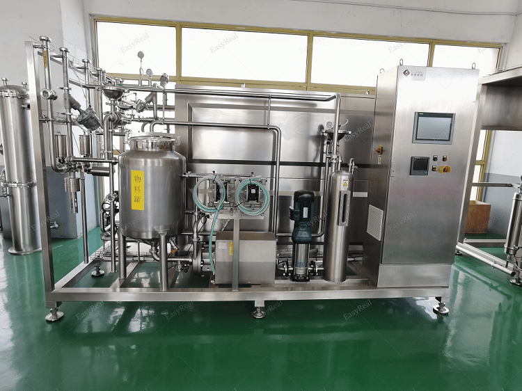 Skid-mounted tubular sterilizer unit with balance tank, tubular heat exchangers, sanitary pumps and PLC touch screen, designed for continuous UHT/HTST sterilization of carrot juice and carrot puree.
