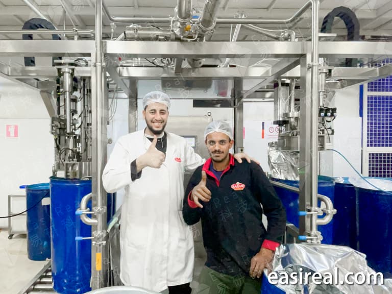 Customer team and EasyReal equipment at the DURRA tomato paste aseptic filling project site in Egypt