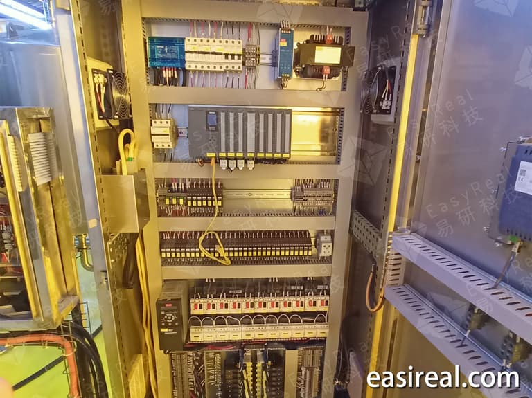PLC-based control panel inside the automatic 3-effect plate evaporation system for coconut water concentration