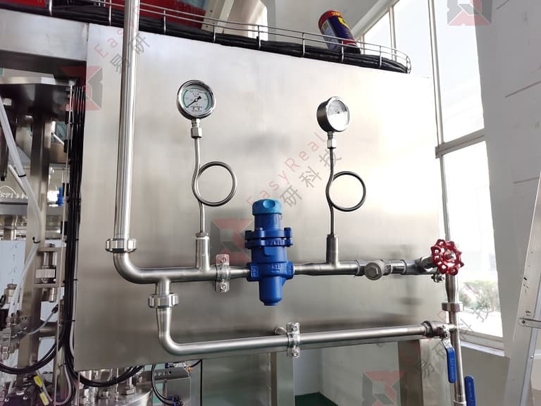 Steam/air utility manifold with pressure gauges, regulator and valves for SIP supply to the aseptic filler