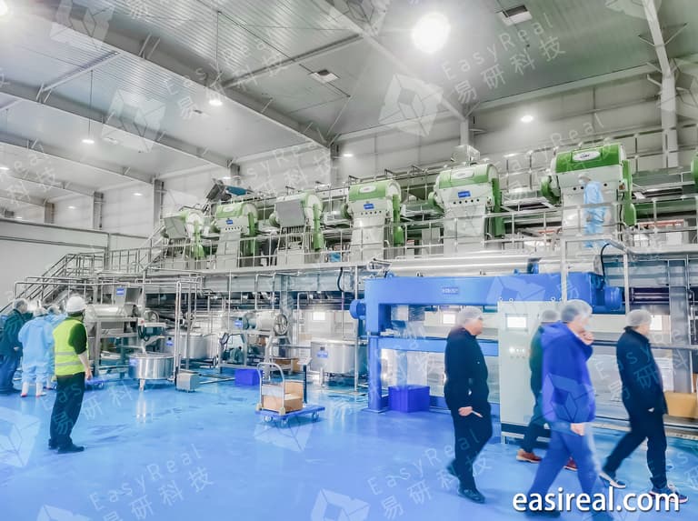 Overall view of the NFC citrus juice processing line with extraction, concentration, sterilization, and aseptic filling sections