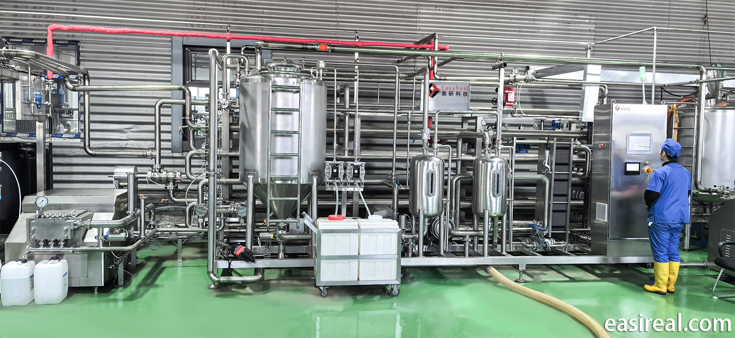 Eden LLC employee operating the Siemens PLC touch screen on the Shanghai EasyReal UHT sterilizer in Mongolia.